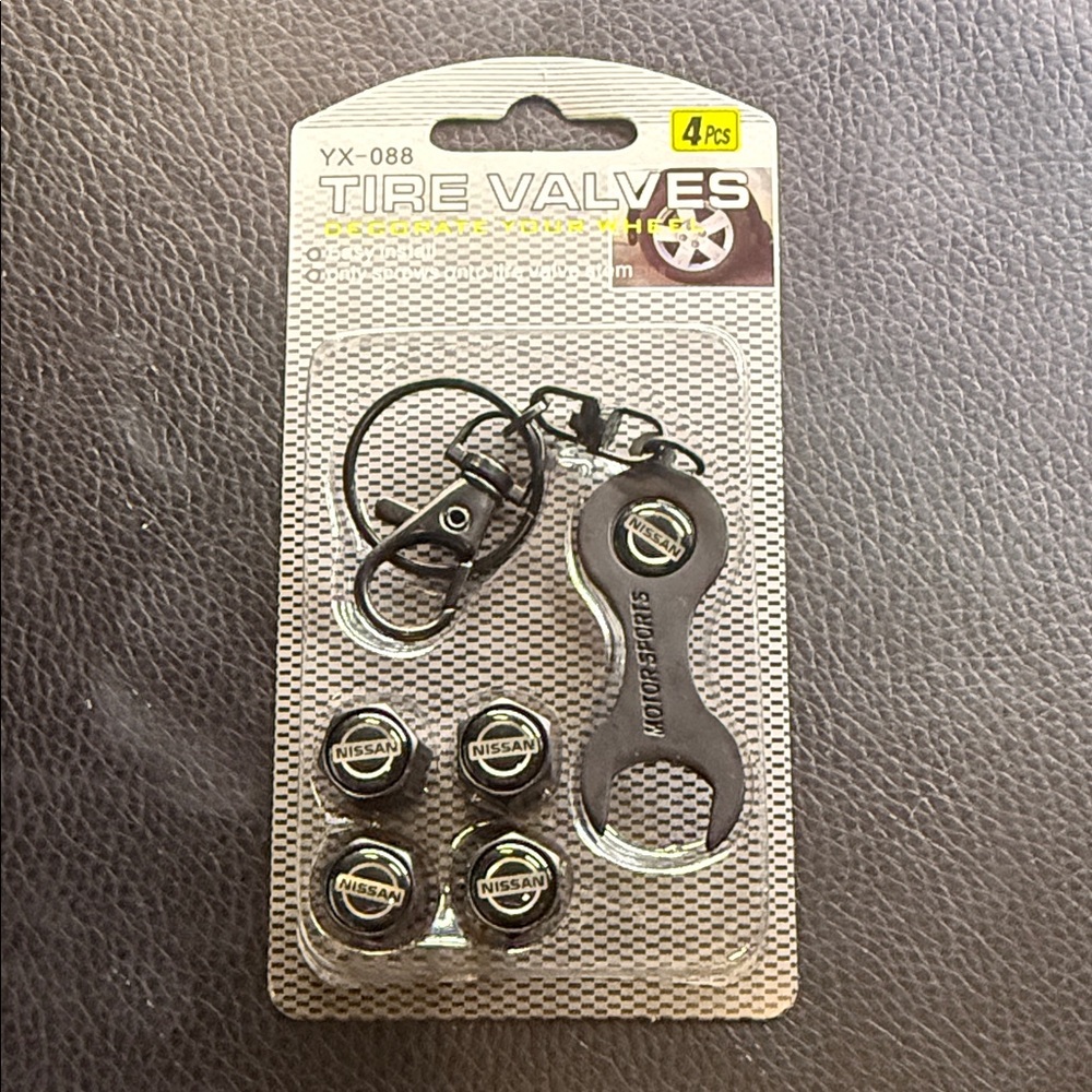 Nissan Black Tire Valve Caps Set